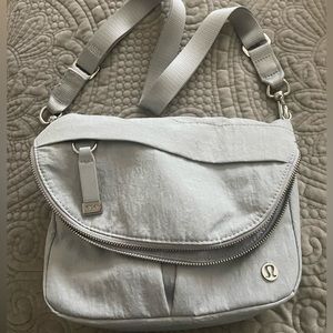 Lululemon light grey shoulder bag, never used, approx 6”x9”